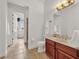 Standard bathroom with neutral fixtures and a separate toilet and shower area at 4533 Burke St, Orlando, FL 32814