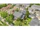 Charming two-story home with a well-maintained yard and mature trees in a residential neighborhood at 4533 Burke St, Orlando, FL 32814