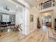 Spacious foyer with wood floors, staircase, and an open view to the office and living room at 4533 Burke St, Orlando, FL 32814