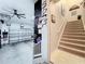 View of the stairs and garage area with an open garage and unique decorations at 4533 Burke St, Orlando, FL 32814