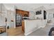 Cozy kitchen featuring wood cabinets, modern appliances, and an inviting breakfast bar at 4533 Burke St, Orlando, FL 32814