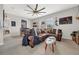 Bright living room with comfortable seating, ample natural light, and views of the backyard at 4533 Burke St, Orlando, FL 32814