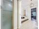 This main bathroom includes a separate shower and soaking tub at 4533 Burke St, Orlando, FL 32814