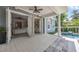 Expansive patio with French doors leading indoors, offering seamless indoor-outdoor living and a pool view at 4533 Burke St, Orlando, FL 32814