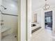 The bathroom features a walk-in shower with a built-in seat at 4533 Burke St, Orlando, FL 32814