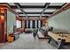 Home theater room with tiered seating, large screen, and a foosball table for entertainment at 4533 Burke St, Orlando, FL 32814