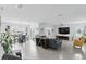 Open-concept living room and dining area featuring tiled floors and neutral paint at 5226 Mahogany Dr, Mount Dora, FL 32757