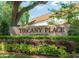 Attractive community sign set amongst well-maintained landscaping at Tuscany Place community at 600 Northern Way # 404, Winter Springs, FL 32708