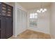 Inviting dining area showcasing tile floors, natural light, and built-in cabinet storage at 600 Northern Way # 404, Winter Springs, FL 32708
