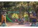 Community playground with bear sculptures, slides, and outdoor seating at 600 Northern Way # 404, Winter Springs, FL 32708