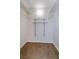 Walk-in closet with carpeted floors and shelving for ample storage space at 600 Northern Way # 404, Winter Springs, FL 32708