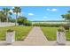 Expansive backyard with beautiful water views and lush green lawn at 716 Palm Circle Dr, Port Orange, FL 32127