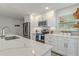 Stylish kitchen with white cabinets, stainless steel appliances, and modern countertops at 716 Palm Circle Dr, Port Orange, FL 32127