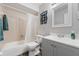 Bathroom featuring tub with shower, and updated vanity at 741 Maderia Ct, Kissimmee, FL 34758