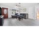 Inviting living room with gray floors, a comfortable sofa, and a cozy atmosphere at 741 Maderia Ct, Kissimmee, FL 34758