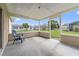 Covered patio overlooking the backyard at 741 Maderia Ct, Kissimmee, FL 34758