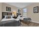 Bedroom with two twin beds and a large window providing natural light at 8201 Roseville Rd, Davenport, FL 33896