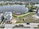 Aerial view of a vacant lot in a residential area near a lake at 8517 Karrer Ter, Orlando, FL 32827