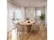 Elegant dining room with modern chandelier, stylish table, and bright, natural light at 8517 Karrer Ter, Orlando, FL 32827