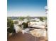 Charming outdoor terrace with a comfortable seating arrangement, perfect for relaxing and enjoying city views at 8517 Karrer Ter, Orlando, FL 32827
