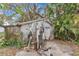 View of the backyard shed with some exercise equipment to its side at 1014 24Th St, Orlando, FL 32805