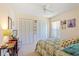 Bedroom featuring a large closet and a large window at 12137 Dickenson Ln, Orlando, FL 32821