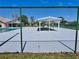 View of the community poolside gazebo and fence, with the pool in the background at 12137 Dickenson Ln, Orlando, FL 32821