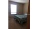 Bedroom with natural light, plush carpet, a large window, and a full-sized bed at 1560 Chelsea Dr, Davenport, FL 33897