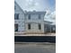 Exterior view of a new construction home in progress, featuring block construction and Typar weather barrier at 166 Hammock Preserve Loop, Winter Garden, FL 34787