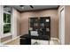 Inviting flex room with natural light, perfect for an office or den space with stylish built-in shelving at 166 Hammock Preserve Loop, Winter Garden, FL 34787