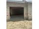 View of single garage of a concrete block structure, focusing on its potential for customization at 166 Hammock Preserve Loop, Winter Garden, FL 34787