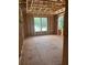 Unfinished living room framed with three windows overlooking the outdoors at 166 Hammock Preserve Loop, Winter Garden, FL 34787