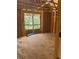Spacious living room under construction, featuring large windows that brighten the area at 166 Hammock Preserve Loop, Winter Garden, FL 34787