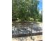 Street view featuring mature trees and a serene, natural ambiance for a welcoming neighborhood at 166 Hammock Preserve Loop, Winter Garden, FL 34787