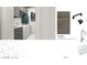 Well-organized utility room with modern cabinetry, laundry appliances, and stylish tile flooring at 166 Hammock Preserve Loop, Winter Garden, FL 34787