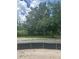 Beautiful vacant lot ready for new construction surrounded by mature trees and lush vegetation at 166 Hammock Preserve Loop, Winter Garden, FL 34787