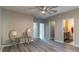 Bonus Room with gray vinyl plank floors and access to the bathroom at 17437 Promenade Dr, Clermont, FL 34711