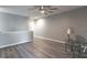 Bonus room featuring gray floors and ample natural light at 17437 Promenade Dr, Clermont, FL 34711