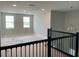 Spacious loft area with abundant natural light, perfect for a home office or play area at 17505 Glossy Pomelo Way, Winter Garden, FL 34787