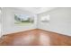 Bedroom with cement floors and lots of sunlight through large windows at 200 Melissa Ct, Sanford, FL 32773