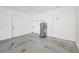 A storage room with gray water heater, white walls, and concrete floor at 200 Melissa Ct, Sanford, FL 32773