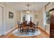 Traditional dining room with hardwood floors, vintage furniture, and elegant chandelier at 201 W 16Th St, Sanford, FL 32771