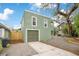 Detached two-car garage with side yard and brick driveway at 201 W 16Th St, Sanford, FL 32771