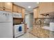 Well-lit kitchen showcasing granite countertops, ample cabinet space, and modern appliances at 201 W 16Th St, Sanford, FL 32771