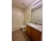 Bathroom with tub shower combo, neutral walls, and modern vanity at 2952 Ashland S Ln, Kissimmee, FL 34741