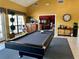 Community game room featuring a pool table, seating area, and coffee station at 304 Summer Place Loop, Clermont, FL 34714