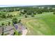 Aerial view of a house with solar panels and a large yard at 3136 Winesap Way, Winter Garden, FL 34787