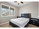 Cozy bedroom featuring neutral tones, natural light, and a ceiling fan at 3136 Winesap Way, Winter Garden, FL 34787