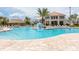 Large community pool with cabana, seating and a water activity for the to enjoy at 3197 Pequod Pl, Kissimmee, FL 34746