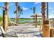 A hammock on a sandy beach area is inviting you to relax and enjoy the view at 3197 Pequod Pl, Kissimmee, FL 34746